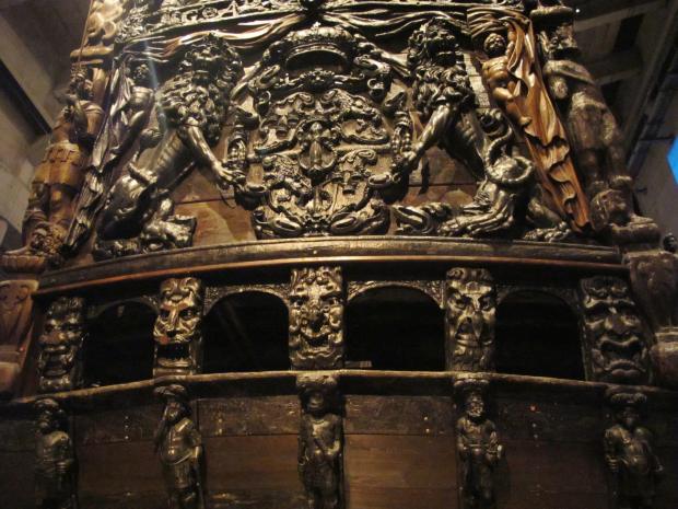 Very elaborate carvings so well preserved that these are all original and there is still original red paint in a lion's mouth